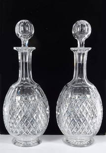 Pair of American Cut Glass Wine Decanters: Pair of American Brilliant period cut glass Wine Decanters, circa early 20th c., decanters are unsigned, stoppers have the number 13 and 18 etched onto them, 12" (h)