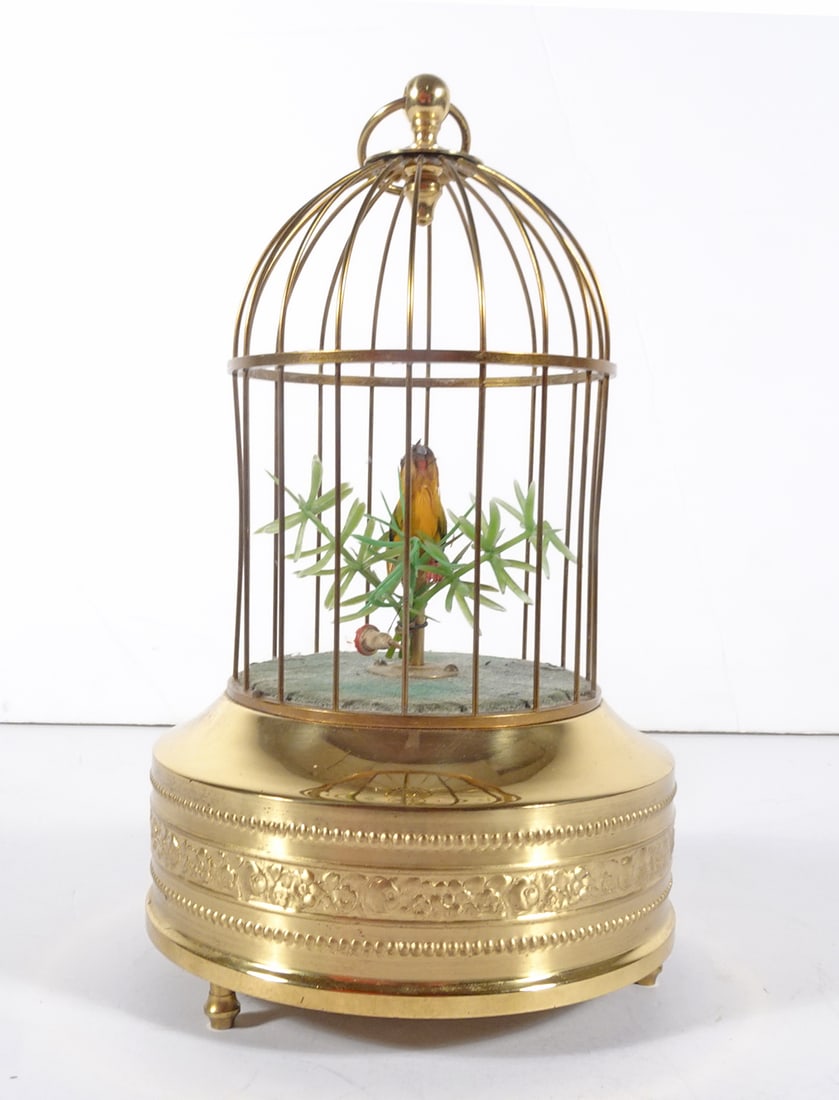 Automaton Singing Bird in Cage: Automaton singing bird in brass cage, circa mid 20th c., unsigned, 9" (height) x 5"