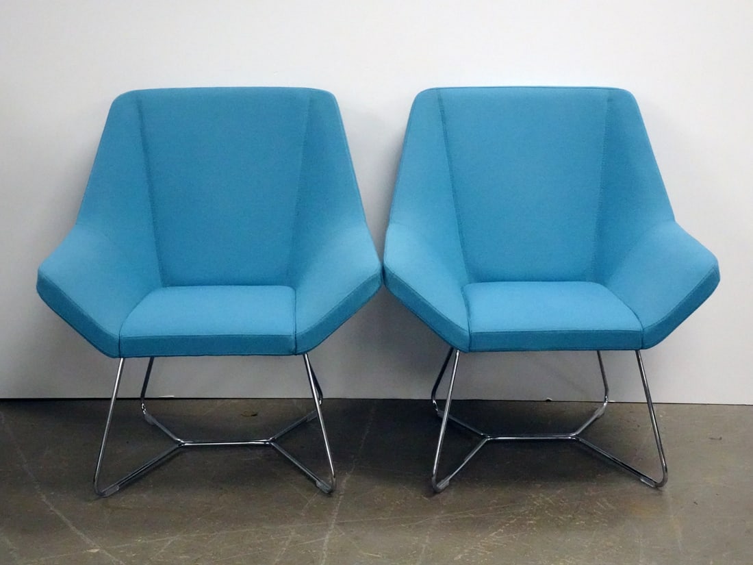 Pair of Keilhauer Cahoots Relax Chairs: Pair of Keilhauer Cahoots #9020 Relax Chairs on Sled Base, blueupholstered with chrome legs, both have company tag attached on underside, circa early 21st c., 33 1/4" (h) x 19 1/2" x 29 1/2"