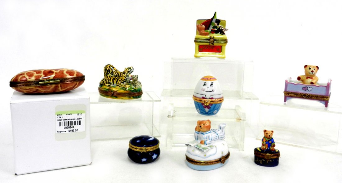 Eight Limoges porcelain pill boxes, including purse: Eight Limoges porcelain pill boxes, including purse, toy chest, two bears, leopards, Humpty Dumpty, bear in crib, and one with stars and moon decoration, all marked Limoges, box measures 3 1/4" high