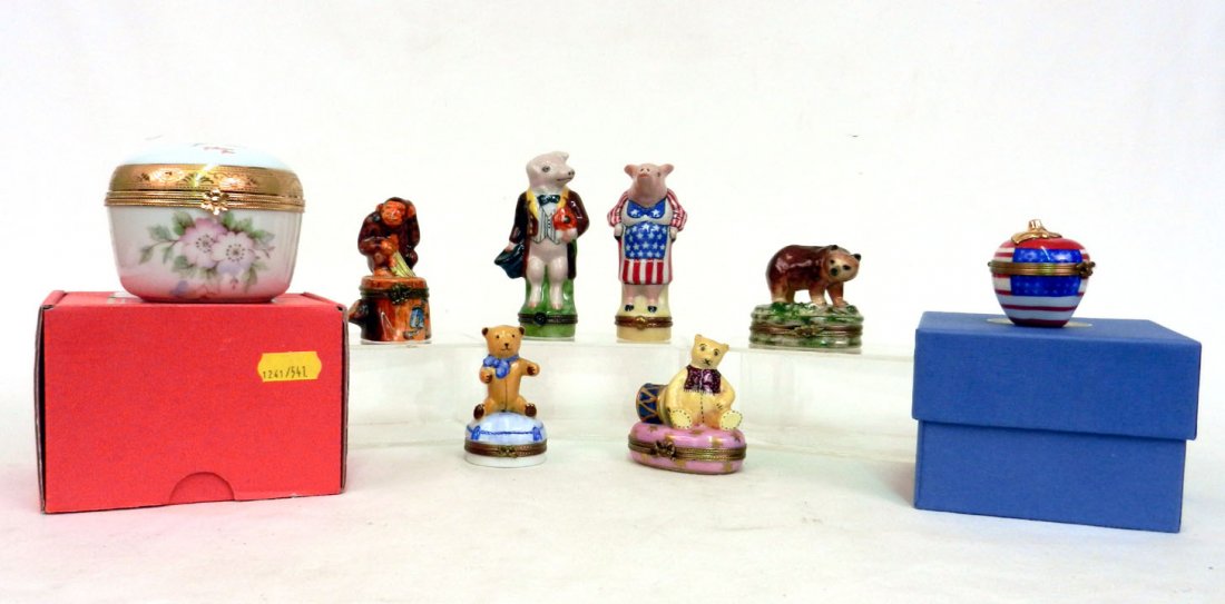 Seven Limoges porcelain pill boxes and one Limoges : Seven Limoges porcelain pill boxes and one Limoges porcelain jewel box with original box, including apple with American Flag in original box, two pigs, gorilla, bear, and two teddy bears, all marked L
