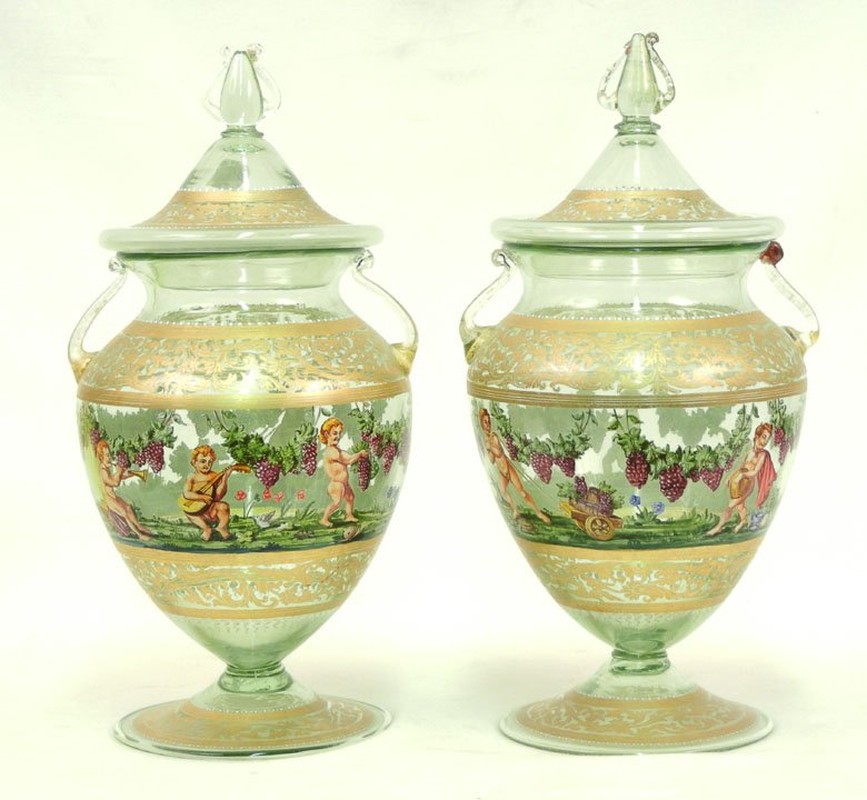 Pair of Murano glass mantle urns, green glass with: Pair of Murano glass mantle urns, green glass with gilt and figural hand painted banding, pontil marks on bottom, double handled, 14 1/2" high