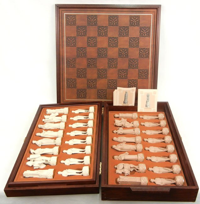 Franklin Mint "The Great Crusaders" chess set in b: Franklin Mint "The Great Crusaders" chess set in box with game board, with piece descriptions, copyright 1984, 12 1/4" high x 21 1/4" across x 4 1/2" deep