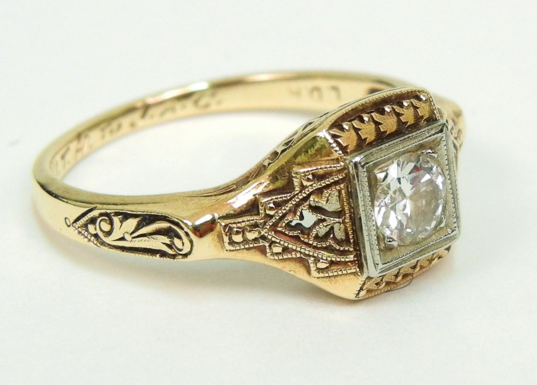 Art Deco filigree diamond solitaire engagement rin: Art Deco filigree diamond solitaire engagement ring, 14K yellow gold filigree mounting with white gold bezel set with old European cut diamond measuring .30 carat, marked 14K, size 6, weight 2.2 grams