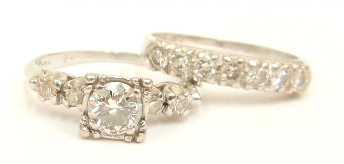 Platinum and diamond wedding ring set, diamond sol: Platinum and diamond wedding ring set, diamond solitaire engagement ring with old European cut diamond measuring approximately 0.60 carats, two diamonds measuring 0.03 carats on either side, wedding b