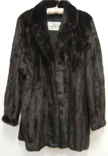 Mary McFadden black mink coat, three quarter lengt: Mary McFadden black mink coat, three quarter length, 36" long from collar to hem, 27" long sleeve, Mary McFadden label, size large, mid 20th C.