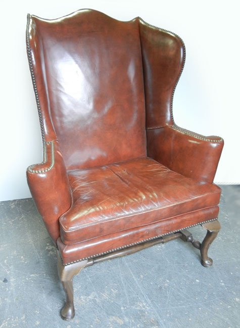 Kittinger red leather wing chair, 46 1/2" high x 3: Kittinger red leather wing chair, 46 1/2" high x 37" x 25"