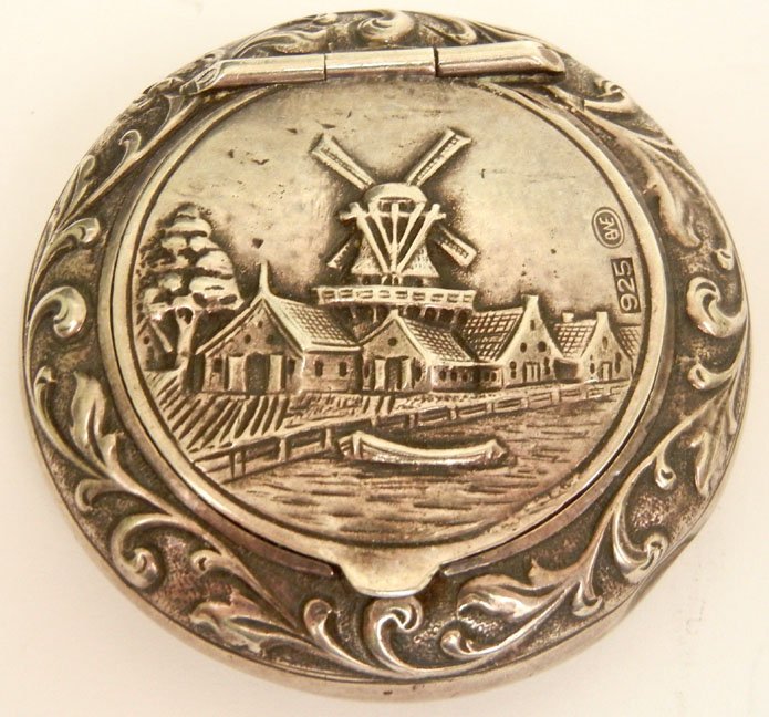 Sterling silver snuff box: Sterling silver snuff box with hinged lid, repousse Dutch canal scene with windmill on lid, impressed 925 and maker's mark (unknown)on lid, monogrammed on bottom, 2" diameter, 26.5 grams