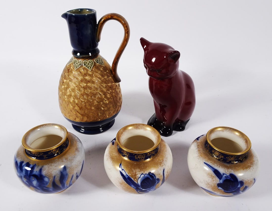 Royal Doulton Decorative Objects Grouping: Five piece Royal Doulton decorative objects grouping, set of three Burslem cabinet vases decorated with gilt overlay and hand painted flow blue Persian Spray floral designs, Lambeth ewer/pitcher with