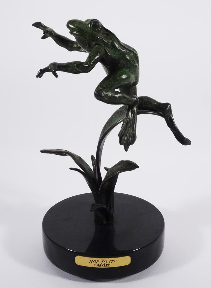 Kim Shaklee Bronze Leopard Frog Sculpture: Kim Shaklee bronze Leopard Frog sculpture, titled "HOP TO IT", signed and dated on one of the leaves Kim Shaklee 1996 with limited edition #3/35, 10" (h) x 5" x 5"