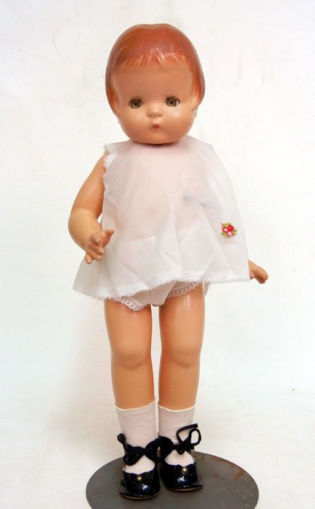 Effanbee "Patsy-Ann" composition doll, yellow sleep: Effanbee "Patsy-Ann" composition doll, yellow sleep eyes, painted and applied lashes, painted closed mouth, wearing dress, underwear, socks, and shoes, marked on back "Effanbee, 'Patsy-Ann', copyright
