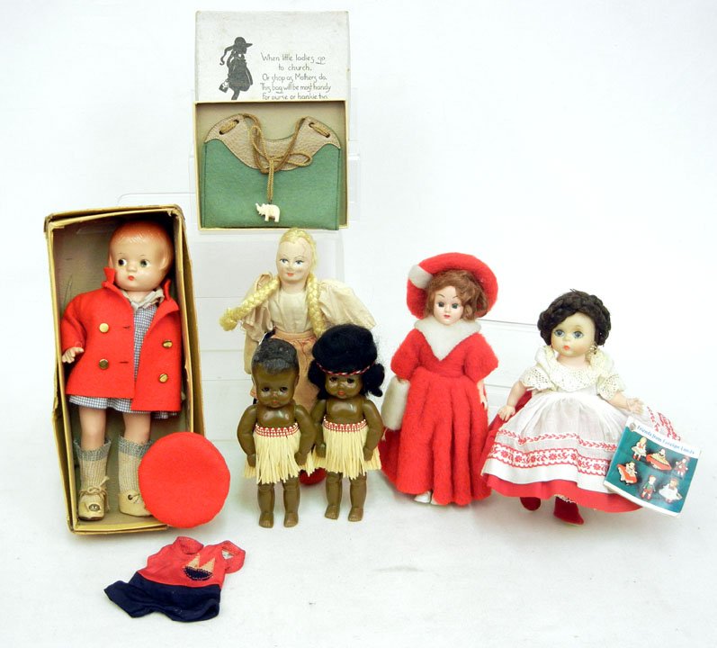 Grouping of dolls, including an Effanbee Patsyette: Grouping of dolls, including an Effanbee Patsyette doll in original box with an additional outfit, Madame Alexander "Russian" doll with tags, hard plastic sleep eye doll, in holiday dress, cloth doll,