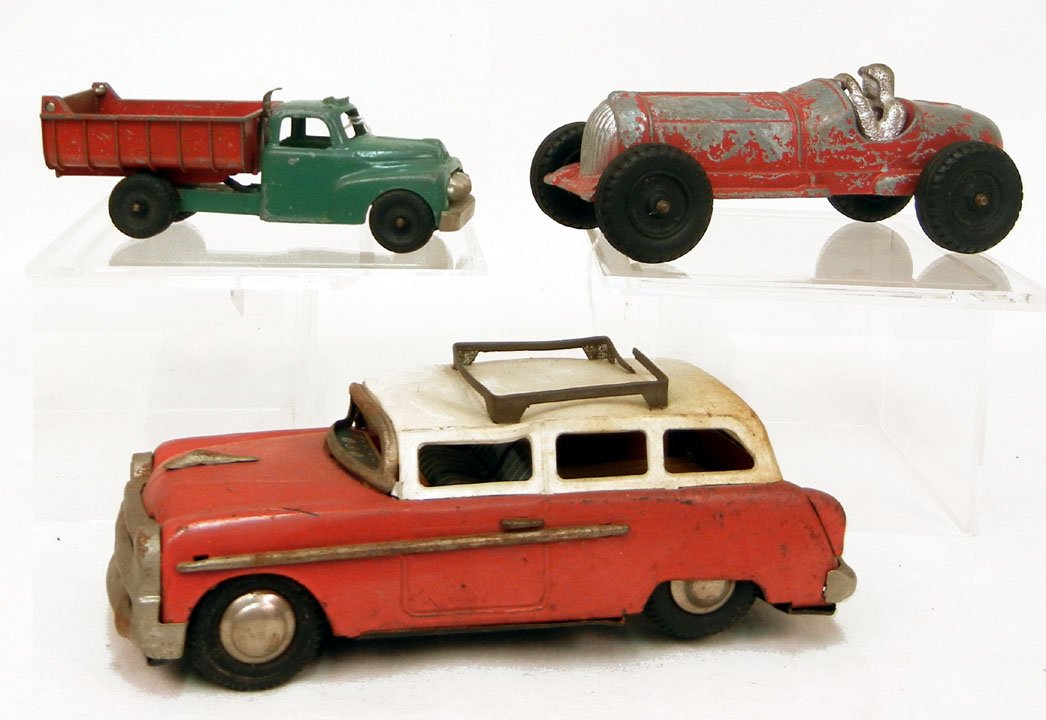 Two diecast and one tin friction toy cars, Hubley : Two diecast and one tin friction toy cars, Hubley Kiddie-T diecast race car #5, Hubley Kiddie Toy dump truck, and a Yonezawa tin friction station wagon, all with makers marks