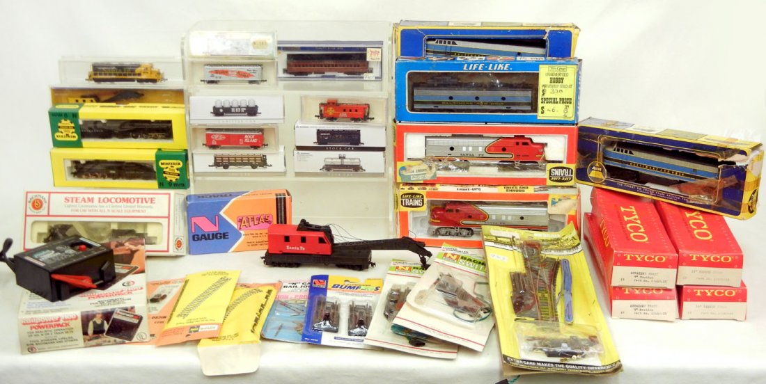 Large grouping of N gauge trains and accessories, : Large grouping of N gauge trains and accessories, including Bachmann, Tyco, Life-Like, Atlas, Minitrix, AHM, and Model Power, Model Power Hobby Transformer, and some track