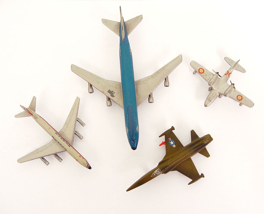 Grouping of four diecast aircrafts, including Schu: Grouping of four diecast aircrafts, including Schuco Boeing 747, Schuco 335- 790 Swiss Air, Mercury Piaggio 136, and an AZ8 Northrop F5A