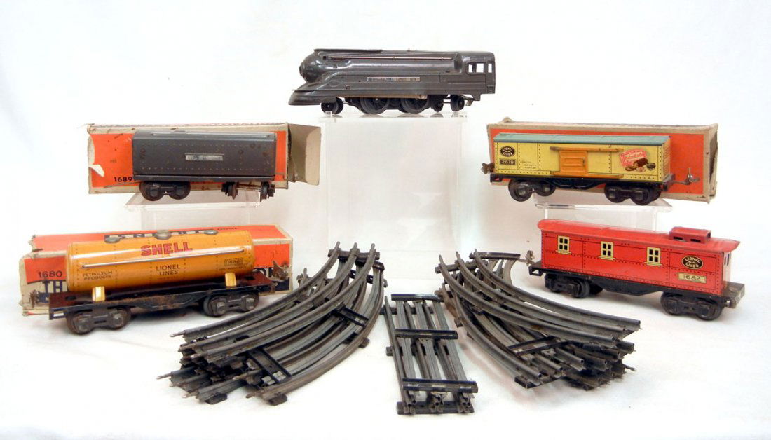 Lionel prewar litho set No. 6401 O27 gauge in orig: Lionel prewar litho set No. 6401 O27 gauge in original box, some cars with individual boxes, including No. 1688 gunmetal loco, No. 1689T tender in box, No. 2679 Baby Ruth box car in No. 1679 box, No.