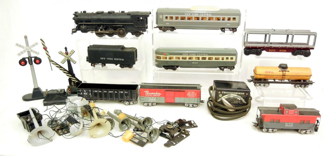 Happi Time electric train set by Marx in original: Happi Time electric train set by Marx in original box, including locomotive and tender, Chesapeake & Ohio gondola, Shell tank car, Pacemaker box car, New York central passenger car, New York Central v