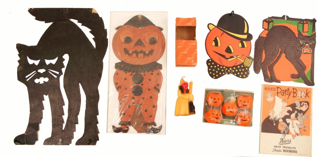 Group of Vintage Halloween decorations: Group of Vintage Halloween decorations including Jack-O-Lantern Candles and Emkay Witch Candle in orig. boxes, Adv. Halloween Party book, die cuts incl. embossed, Luhrs, Germany, USA, and one homemade