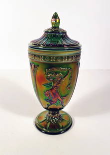 Fenton Glass Dancing Ladies Covered Urn: Fenton Art Glass Co. Dancing Ladies covered urn, iridescent amethyst and green carnival glass color, special 100th anniversary design by sculptor Suzi Whitaker, signed with Fenton in circle mark on