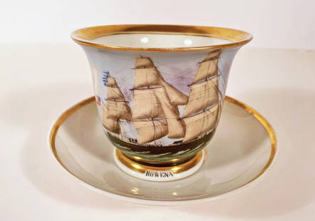 German Porcelain Ship's Cup and Saucer: German porcelain ship's cup and saucer, cup is decorated with a hand painted design of the Rowena Ship of Liverpool, saucer with gilt name E.R. Burrons and the date 1856 in center, cup is signed on