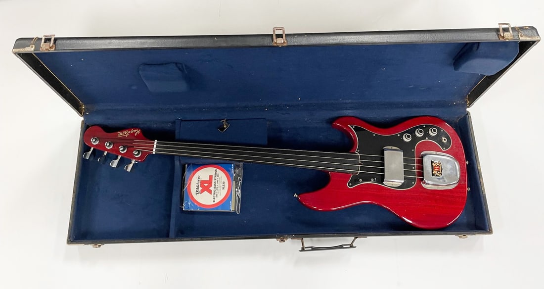 Hagstrom Four String Fretless Electric Jazz Bass: Hagstrom four string fretless electric Jazz bass, Scan model, serial no. 53 988020, Burgundy wine colored mahogany finish, made in Sweden, circa 1978, comes with its original rectangular hard shell ca