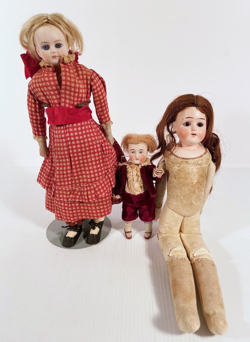 Three dolls: Antique Belton type shoulder head doll with blue glass eyes and kid body 13", 15" bisque shoulder head doll marked SHPB (Schoenau Hoffmeister Porzellanfabrik Burggrub) Germany with brown glass eyes, o