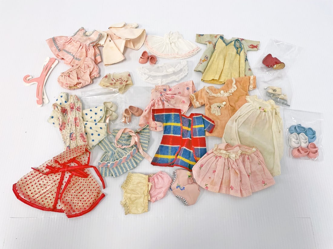 Mixed group of 1950's mostly 8" doll outfits: Mixed group of 1950's mostly 8" doll outfits including Ginny, Ginger, Muffie and others, clean