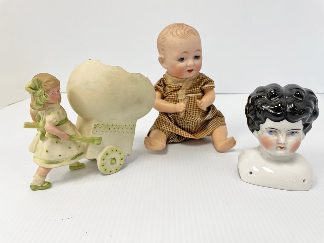 Assorted group of antique bisque doll, head, etc. (1 of 1)