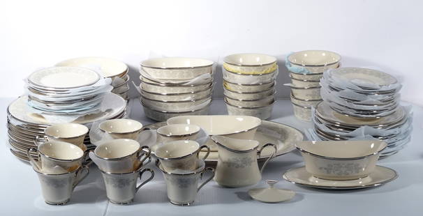 Lenox Snow Lily Pattern China Set: Lenox Snow Lily pattern eighty-eight piece service for twelve china set, 3/8" (h) x 6 3/8" Bread and Butter Plates, 5/8" (h) x 8 1/8" Salad Plates, 3/4" (h) x 6" Saucers for Footed Cups, 7/8" (h) x