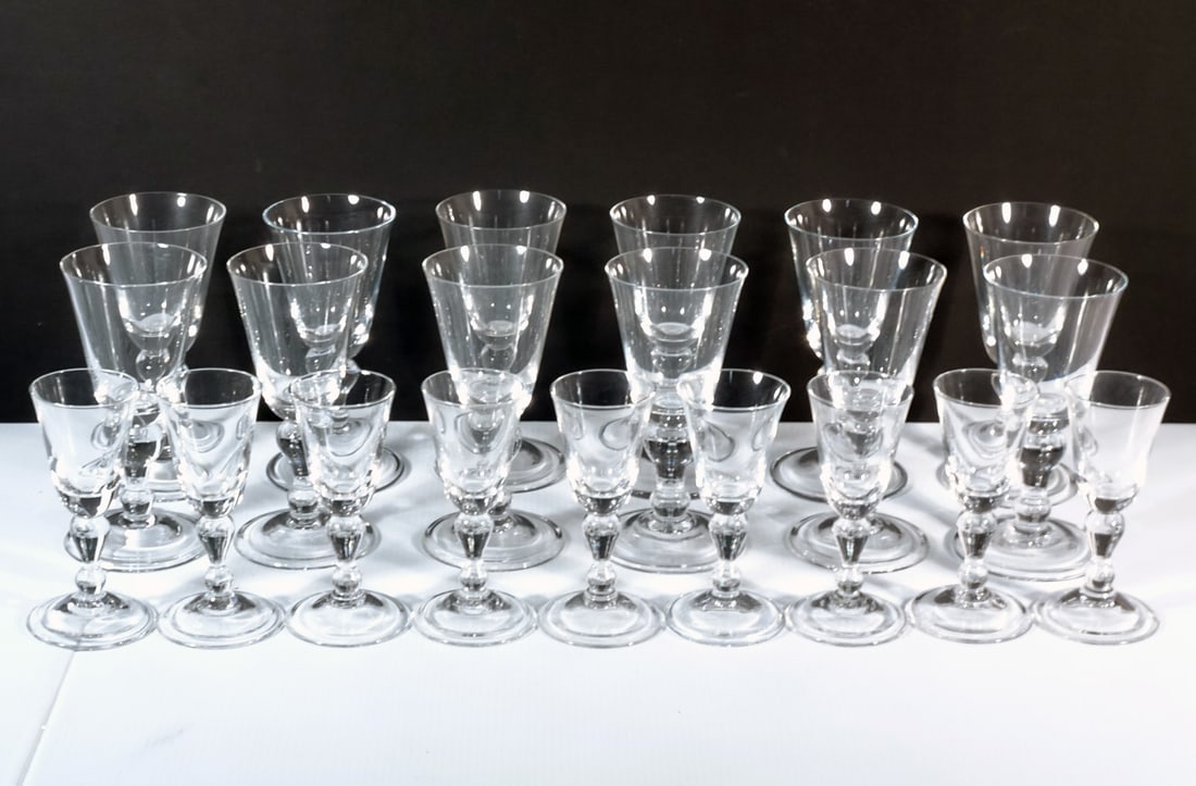 Blenko Glass Baluster Pattern Stemware: Blenko Glass Company Baluster pattern stemware, clear colored, 5 7/8" Wine Glass (qty 9) and 7 1/2" Water Goblet (qty 12), unmarked, circa mid 20th c. to late 20th c.