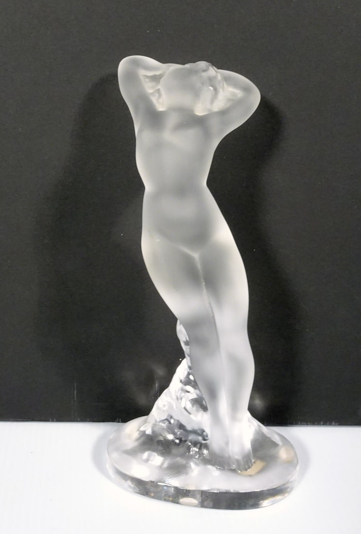 Lalique Crystal Nude Dancer Arms on Head Figure: Lalique French frosted crystal glass Nude Dancer Arms on Head figure, style #11908, signed Lalique France along right side edge of base, circa mid 20th c., 9 1/4" (h) x 4 1/2" x 3"