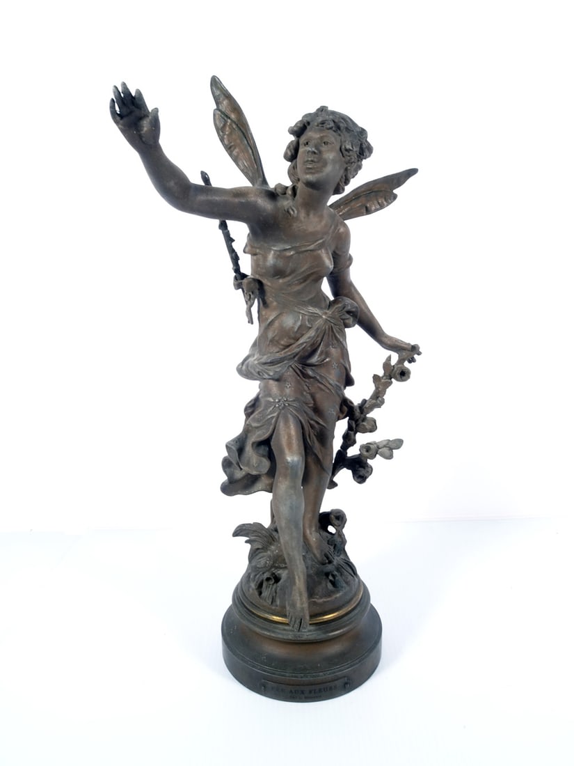 Louis Moreau Spelter Metal Sculpture: Louis Moreau (French artist, 1883-1958) spelter metal sculpture, tilted on applied brass plaque FEE AUX FLEURS Par L. Moreau, signed on grass formation base of sculpture L. Moreau, circa early 20th c.