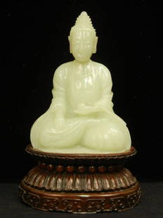 White jade carving of seated Buddha, on original w: White jade carving of seated Buddha, on original wooden stand, China 18th C., 4 1/2" high, ex. collection of Henry Francis Du Pont, with the appraisal from 1981.