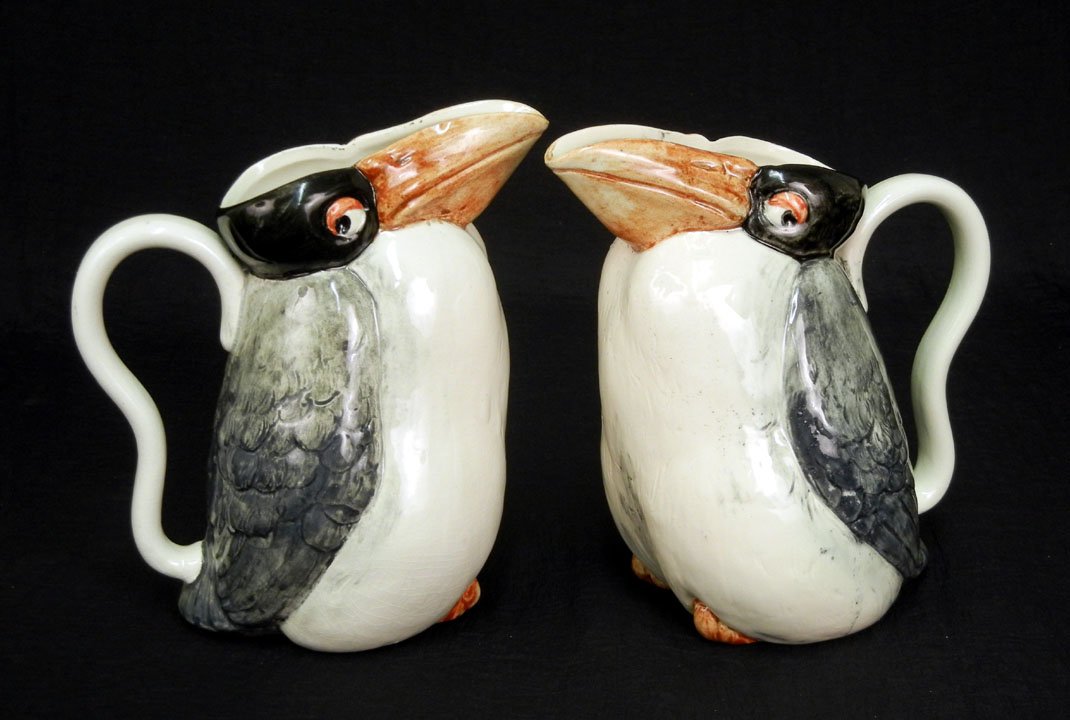 Pair of Sarreguemines raven figural bird pitchers,: Pair of Sarreguemines raven figural bird pitchers, both impressed on bottom "Sarreguemines France 3567, DTC 531", 7 1/2" high