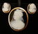 276: Gold and black onyx cameo pin and earrings set, 14