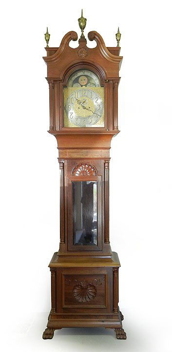 J.E. Caldwell cherry grandfather's clock, moon dia: J.E. Caldwell cherry grandfather's clock, moon dial, presentation inscription on pendulum dated 1903, three brass finials, shell carving on lower case, paw feet, 96" high x 26" x 16"