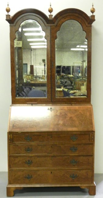 English double bonnet burled walnut secretary desk: English double bonnet burled walnut secretary desk, domed top with gilt lacquer finials, glass doors added later, green tooled leather writing surface, intricate interiors with various doors, drawers,