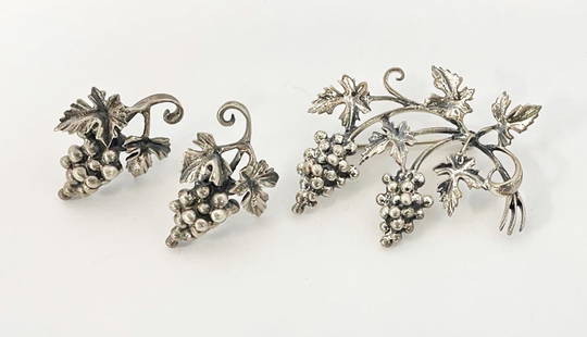 Danecraft Sterling Brooch and Earrings: Danecraft sterling brooch and earrings set, grape bunches and leaves design, screw-back earrings, all stamped Danecraft Sterling brooch 2" x 1 1/2", earrings 30mm x 22mm, 22.3 grams total weight