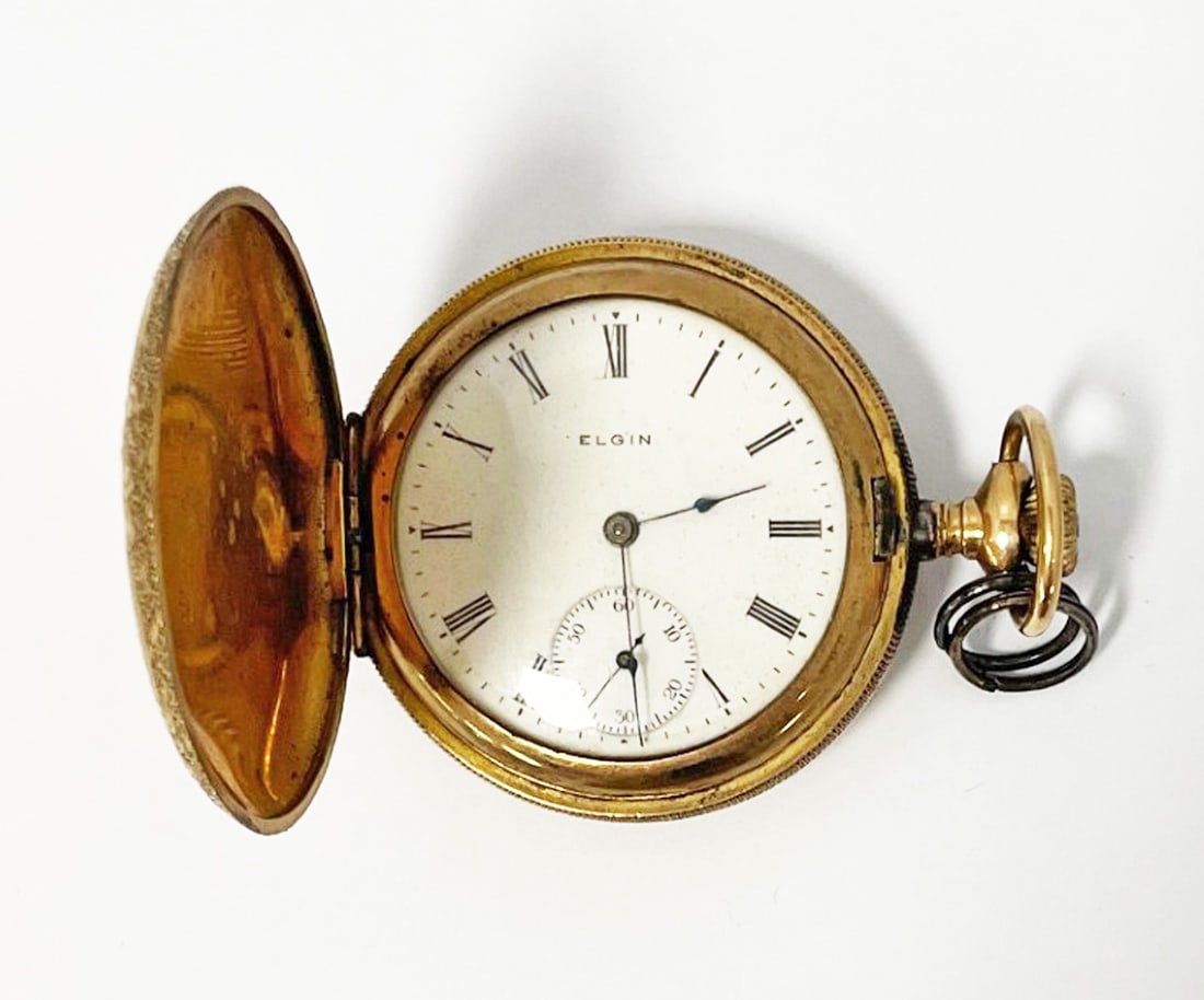 Elgin Gold Filled Hunter Pocket Watch: Elgin gold filled hunter pocket watch with scroll, plume and floral design on front and back, enameled dial with black Roman numerals, second hand dial below, works stamped 13749269, Safety Pinion, El