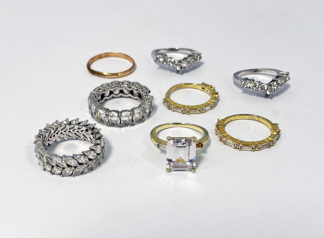 Sterling Rings: Eight rings, seven with stones marked 925, one unmarked, weight of seven sterling rings 24.9 grams, all rings with stones are size 5 1/2-6, unmarked ring size 8 1/2