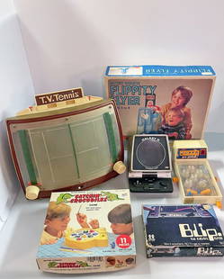 Vintage Battery Operated Toys Grouping: Epoch Co. Ltd. 7" (h) x 5 1/2" x 7" Galaxy II Electronic Game, Galoob 4" (h) x 4 1/2" x 9" Pro Pinball, Louis Marx and Co. Inc. 14" (h) x 13" x 16" TV Tennis, Play Zone Inc. Catchin' Crocodiles Game w