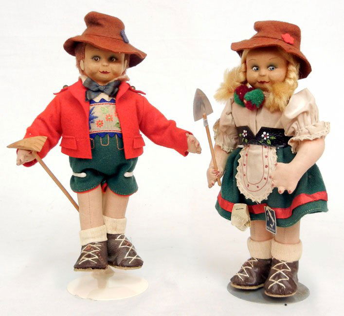 Pair of boy and girl Lenci type dolls with original tag: Pair of boy and girl Lenci type dolls with original tags, painted features, ca. 1940, 9 1/2"