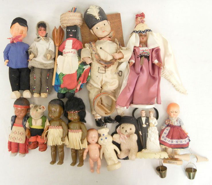 Grouping of assorted dolls including tribal dolls, hard: Grouping of assorted dolls including tribal dolls, hard plastic, celluloid, Steiff Puss 'n Boots, cloth dolls, and more.