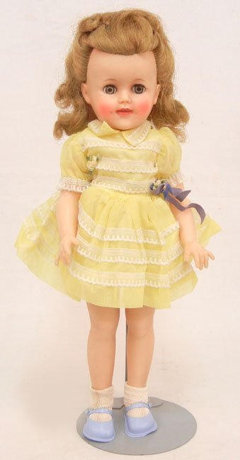 Ideal Shirley Temple doll, 15", vinyl, wearing original: Ideal Shirley Temple doll, 15", vinyl, wearing original yellow dress, 1957