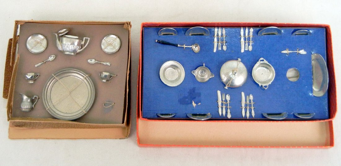 Two sets of German doll tea sets and tableware, metal, : Two sets of German doll tea sets and tableware, metal, 1940's to '50's