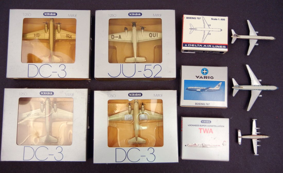 Seven Schabak boxed aircrafts, including four at 1:250 : Seven Schabak boxed aircrafts, including four at 1:250 scale: three DC-3 Douglas and a JU-52 Junkers, and three at 1:600 scale: 907/12 Boeing 767, 908/21 Boeing 757, and a 934/10 Lockheed Super Conste