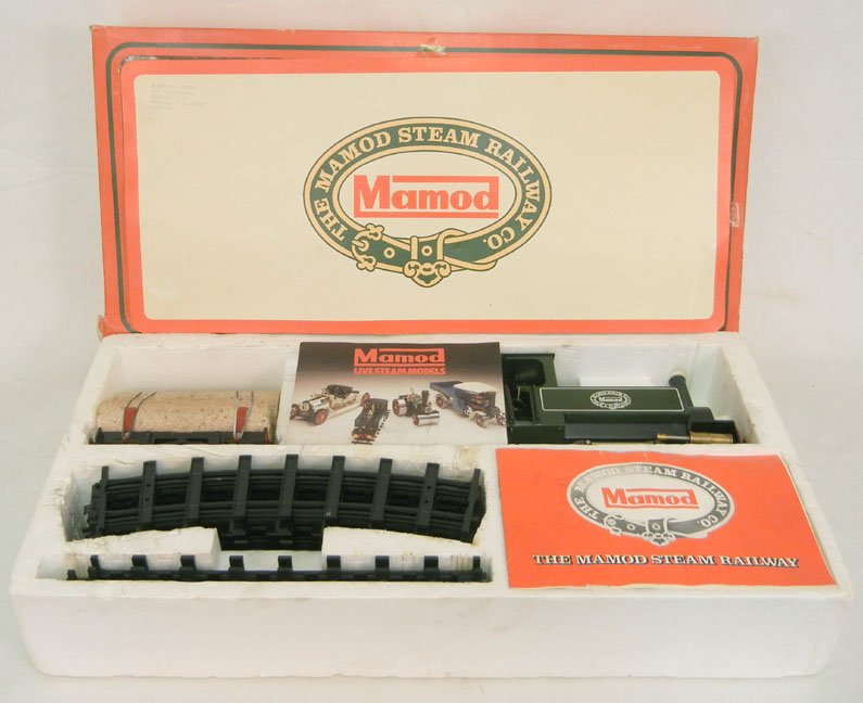 Mamod Steam Railway Co. RS1 in original box, Railway Sy: Mamod Steam Railway Co. RS1 in original box, Railway System One with a steam loco SL1, Open Wagon RW1, and Lumber truck RW2, two boxes of Solid Fuel tablets, and additional loose fuel tablets, Mamod S