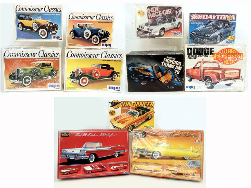 Eleven boxed car model kits, including Pontiac Firebird: Eleven boxed car model kits, including Pontiac Firebird Trans Am '79, Gunze Sangyo Ford '59 Fairlane 500 Skyliner, Gunze Sangyo Cadillac '59 Eldorado Biarritz, and eight MPC kits, including Connoisseu