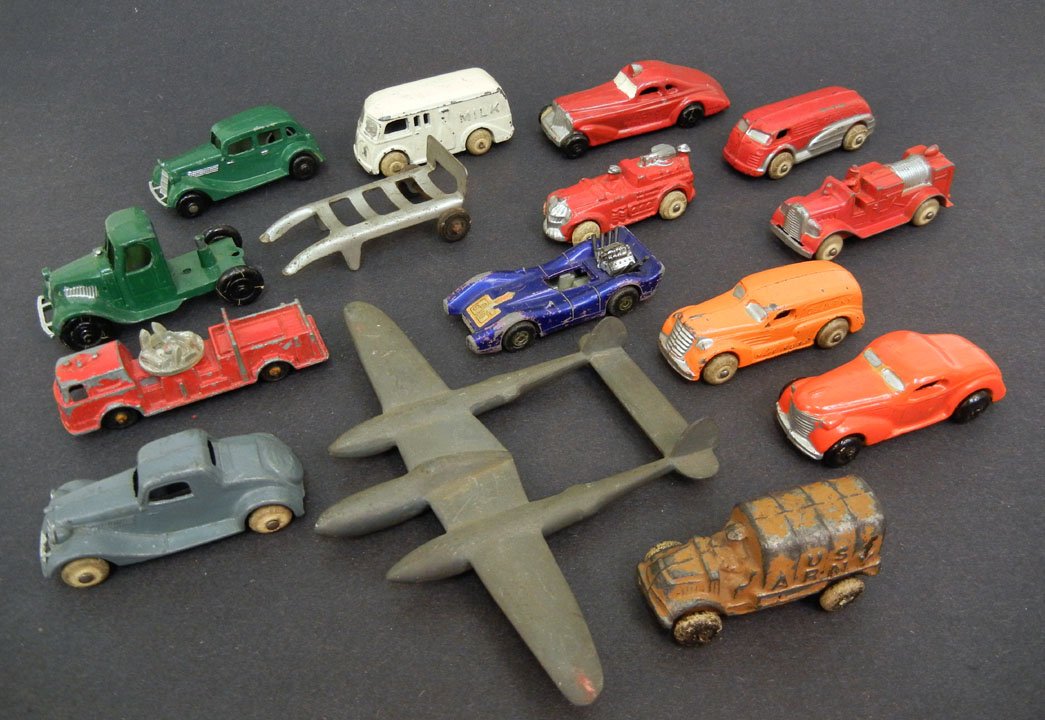 Grouping of fifteen diecast vehicles and aircrafts, inc: Grouping of fifteen diecast vehicles and aircrafts, including Tootsietoy, Matchbox by Lesney, and some marked Made in U.S.A.