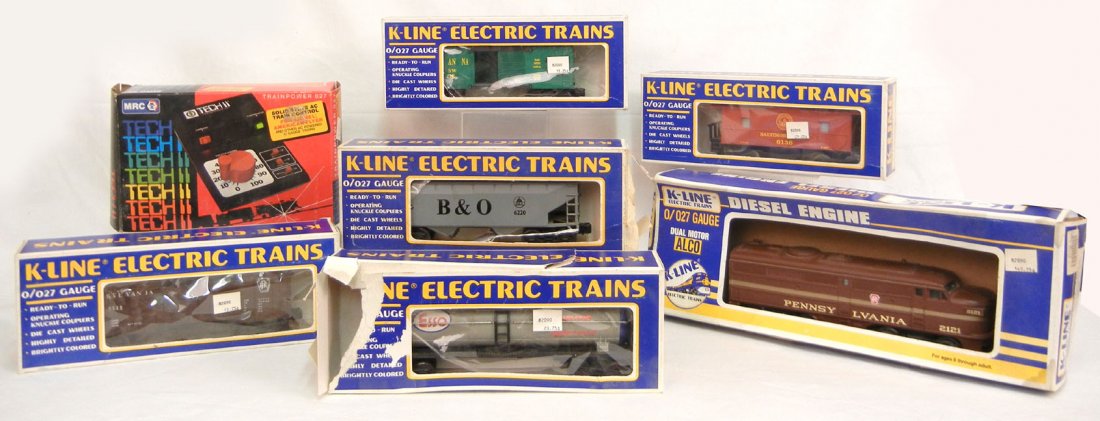 K-Line 0/027 gauge electric train set in boxes, includi: K-Line 0/027 gauge electric train set in boxes, including K-2121 Diesel engine, K-5111 Pennsylvania RR box car, K-5118 Susquehanna/ Susie Q box car, K-6136 B&O lighted caboose, K-6220 B&O covered hopp